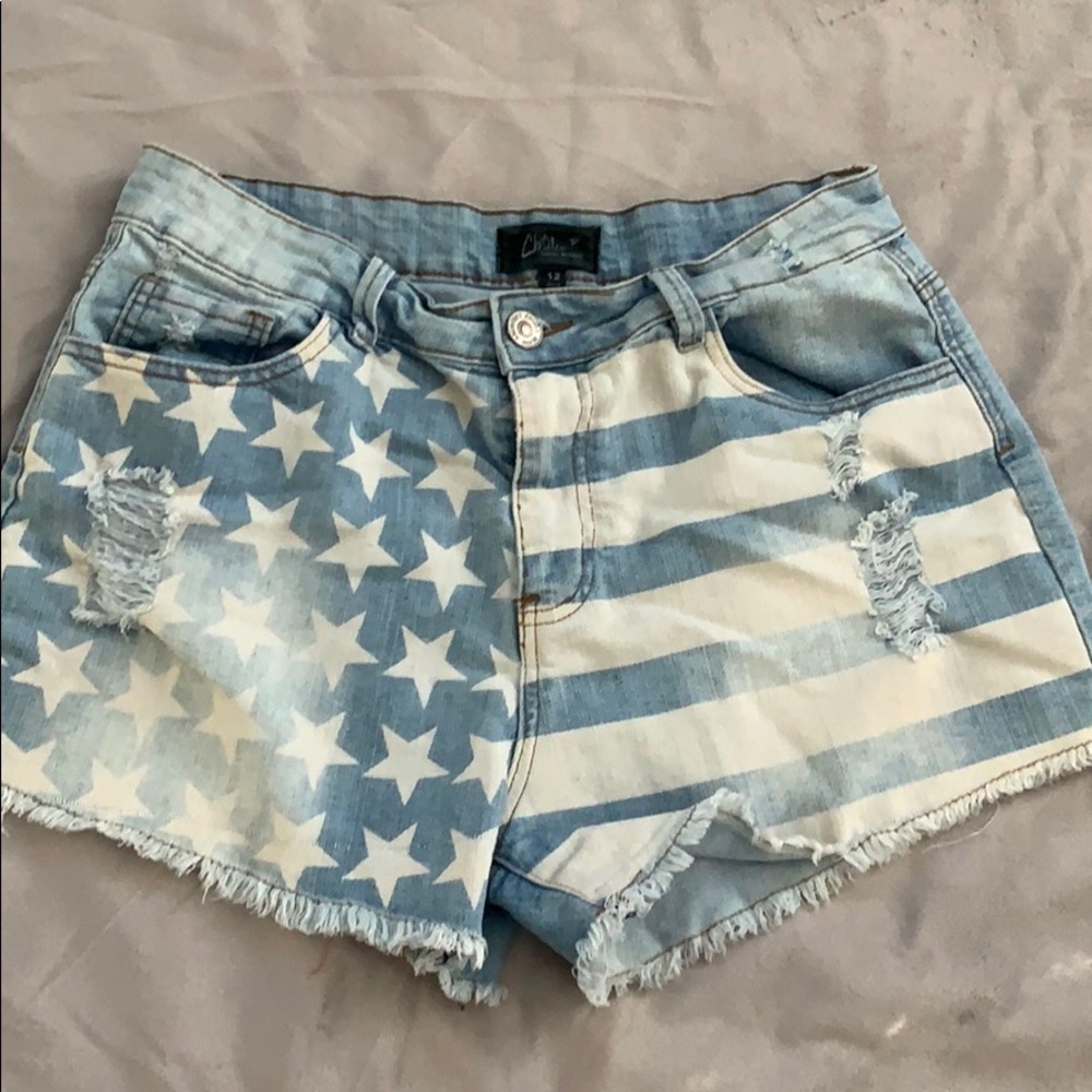 Distressed high waisted denim American Flag shorts
